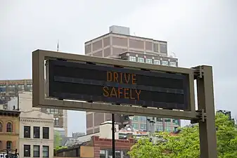 A dual row matrix LED sign in Manhattan reminding motorists to drive safely