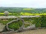 Curtain wall, gates and gatepiers attached to and approx. 50 metres north and west of Rockingham Castle