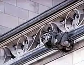 Gargoyle showing carver Roger Morigi with carver's tools, Washington National Cathedral, Washington D.C., USA