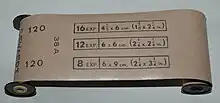 A guide on a roll of 120 film showing how many exposures it can take with different frame sizes