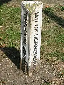 Boundary marker at Roneo Corner