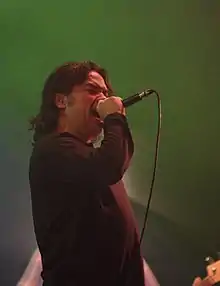 Reyes performing with Black Flag in 2013