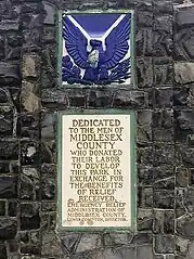 Roosevelt Park stone monument plaque on front