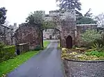 Gate with flanking lodge and tower to north of Rose Castle