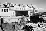 A Luftwaffe aircraft hangar built to resemble a street of village houses, Belgium, 1944