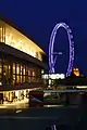 North-western facade at night with the London Eye and Palace of Westminster upriver, November 2009