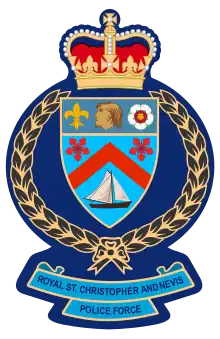 The emblem of Royal St Christopher and Nevis Police Force featuring the Crown