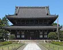 Two story pagoda in dark wood