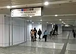 Commuters walking towards the MRT station from the link