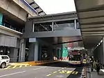 External view of the pedestrian link bridge over Jalan Sultan Mohamed, with the LRT station at left and MRT station at right.