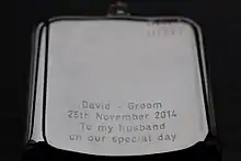 A modern engraved hip flask