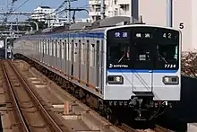 A New 7000 series EMU in revised livery in October 2020