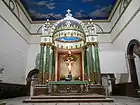 The old main altar and the ciborium above it