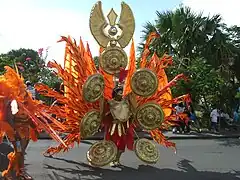 A costumed carnival dancer.