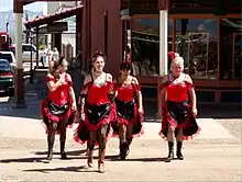 Modern re-enactors dressed as saloon girls