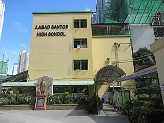 Jose Abad Santos High School with the Abad Santos Monument in San Nicolas, Manila