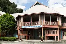 A few years earlier, Fr. Mulders had also completed another major challenge — the construction of a new block of class rooms for the St. Mary's Primary School for which he was the Principal. Prior to this, school and church functions were conducted in temporary, post WWII structures, mainly of timber, kajang and attap.  In the absence of low-loaders in the 50's, Fr. Mulders' small tractor (an Allis Chalmers) had to crawl its way from the town wharf to the church site. Before this could be done, the Government road had to be protected. This was where the "forced" labour came in as a work-gang, consisting of boarders from the school was ordered to place timber planks for the bulldozer to run on and then shift them to the front as soon as the tractor had passed.