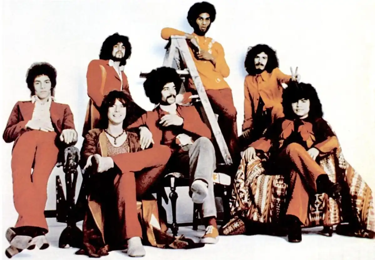 The "classic" line-up in 1971.Left to right: Neal Schon, Gregg Rolie, Michael Shrieve, Michael Carabello, David Brown, Carlos Santana, José "Chepito" Areas.