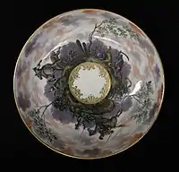 Saucer with fighting Orientals, from a tea and coffee service