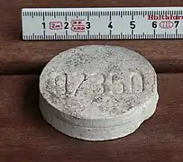 (Germany) A piece of fire clay used for identifying the ash after burning the dead body