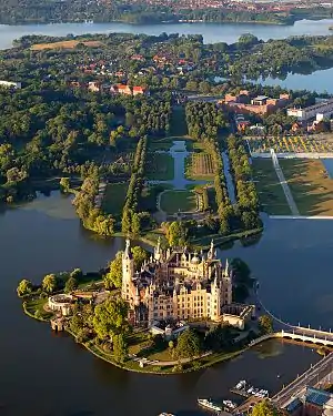 A castle in a middle of a lake