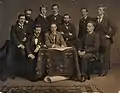 A circa 1890 group portrait of Scottish architects, including William Fraser, ARIBA, standing, center. Private Collection.