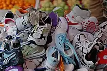 Shoes and fruit at a Hong Kong market (2007)