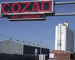 Sign marking the 100th meridian on U.S. Highway 30 in Cozad