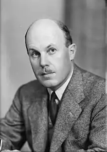 Black and white portrait photograph of Sir Randle Feilden taken in November 1949