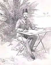 Lord Kitchener (then Sir Kitchener) working at a folding table in Sudan.