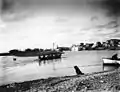 A small boat navigates the Snake River in Nome September 29, 1909