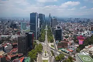 The Paseo de la Reforma is a wide avenue designed by Ferdinand von Rosenzweig in the 1860s and was modeled after the Champs-Élysées in Paris.[71] The avenue combines old and modern buildings.