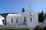 The property on which this church complex is situated was bequeathed to the London Missionary Society in 1842 by Mrs Dorothy Edwards, widow of the Rev. John Evans of Cradock. The parsonage, which was built in the Victorian style, dates from the period 1825.
Type of site: Church.