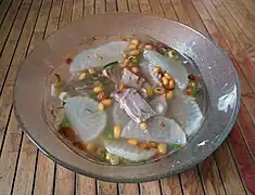 Soto Bandung, beef in clear broth with white radish and fried soy nuts