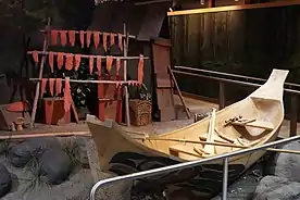 Southeast Alaska Discover Center, Ketchikan, Alaska. Fish camp, Tlingit, Haida, and Tsimshian.  Salmon fillets were soaked in a salt solution, draped over drying racks to dry then taken to the smokehouse and hung over slow burning fires.