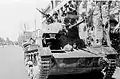 Soviet T-26 Tank passing through the main street of Tabriz, World War II.