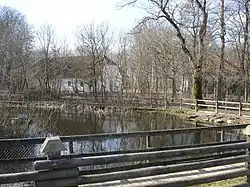 Manse and parish house behind the village pond