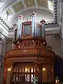 The organ above the entrance doors