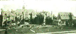 B&W exterior photo of a school campus with several buildings