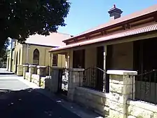 Streetscape showing all three buildings