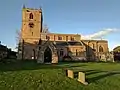 Group Of 3 Headstones Adjoining South Side Of Tower At Church Of St Peter And St Paul