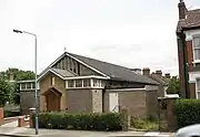 Low light coloured brich church building