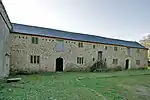 Stabling and cobbled pavements adjoining Godolphin House