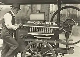 Scissors grinder with "Dutch grinding cart" in Amsterdam, c. 1930