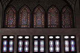 Iranian stained glass designs inside the Tabātabāei House.