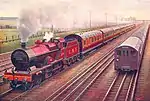 Watford tube train running alongside LMS Steam train