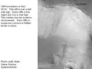 Enlargement of the photo on the left showing cliff.  Photo taken with high resolution camera of Mars Global Surveyor (MGS).