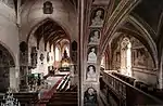 Interior of an old church with frescos