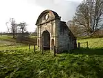 Ornamental Archway 250m South West from Stoke Rochford Hall