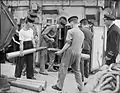 Crew storing fixed rounds on the Kingfisher class sloop HMS Widgeon, August 1943